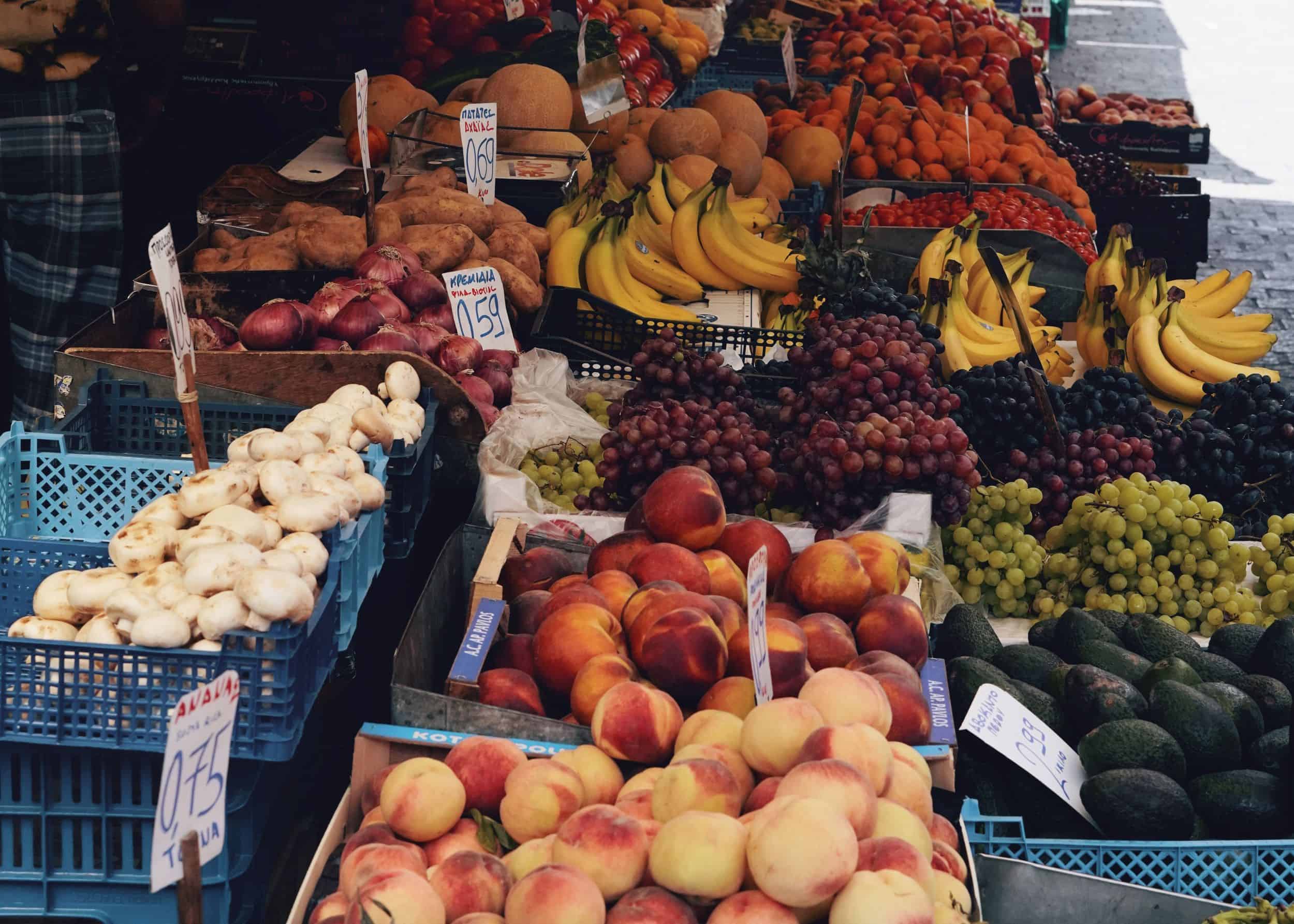 Rows of fruit and produce at outdoor market
