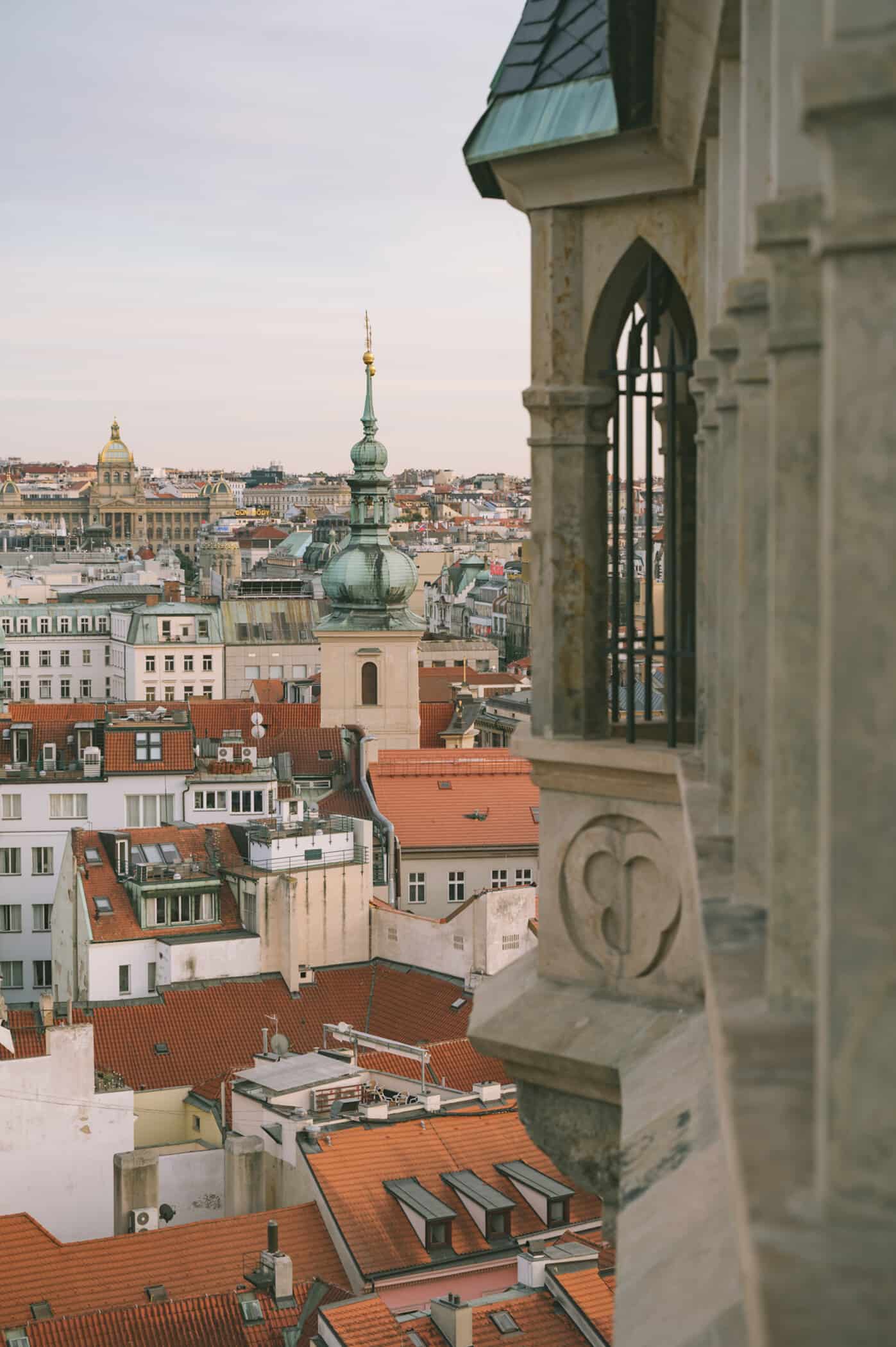 View from a high balcony over town filled with old buildings
