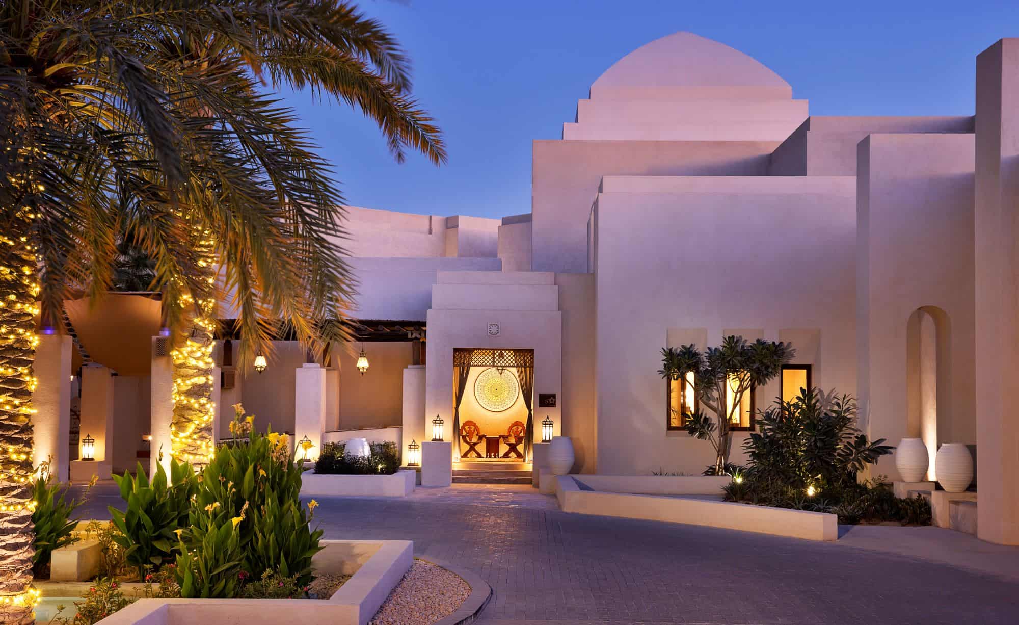 Exterior of hotel room entrance in the evening