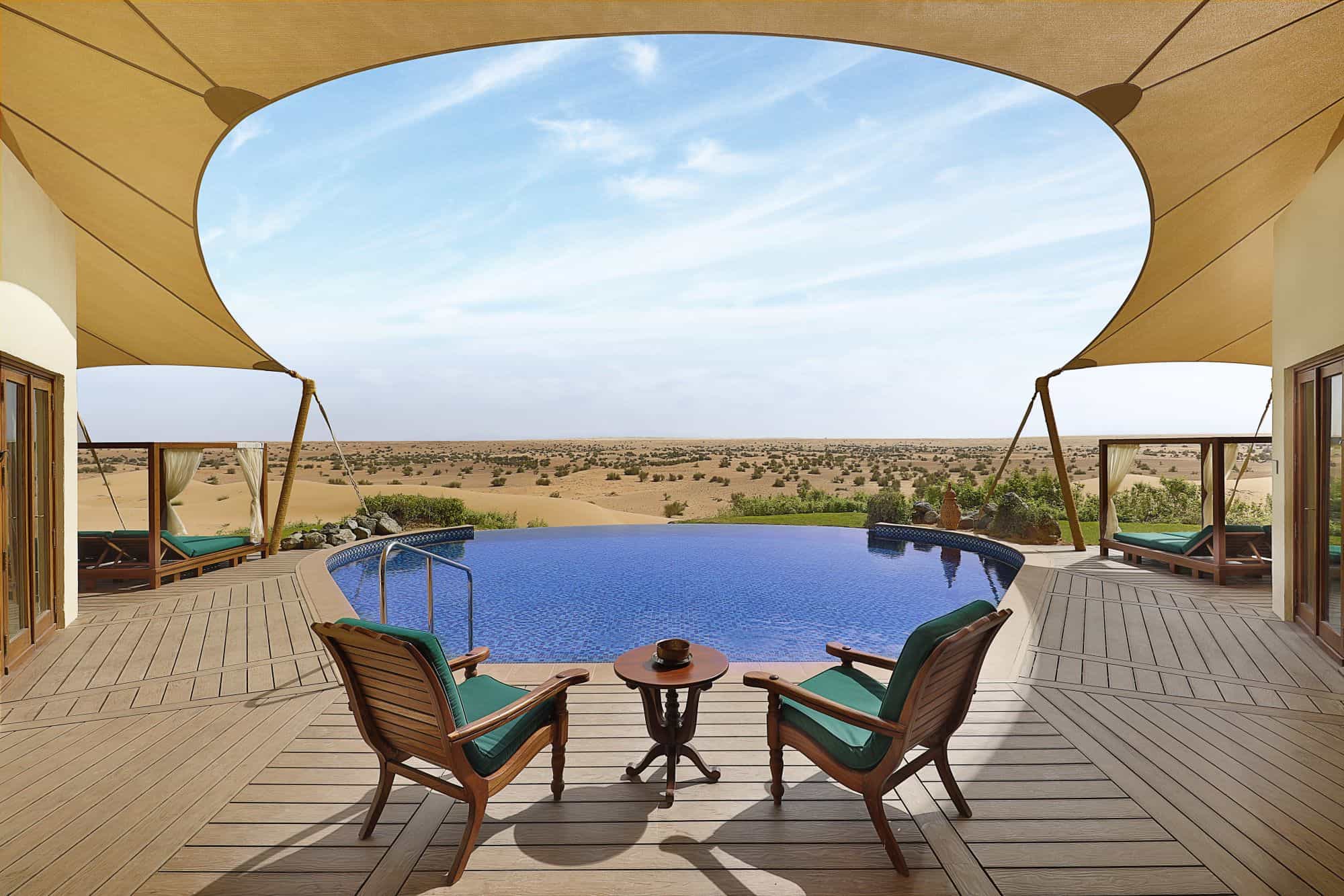 Private pool deck with desert view
