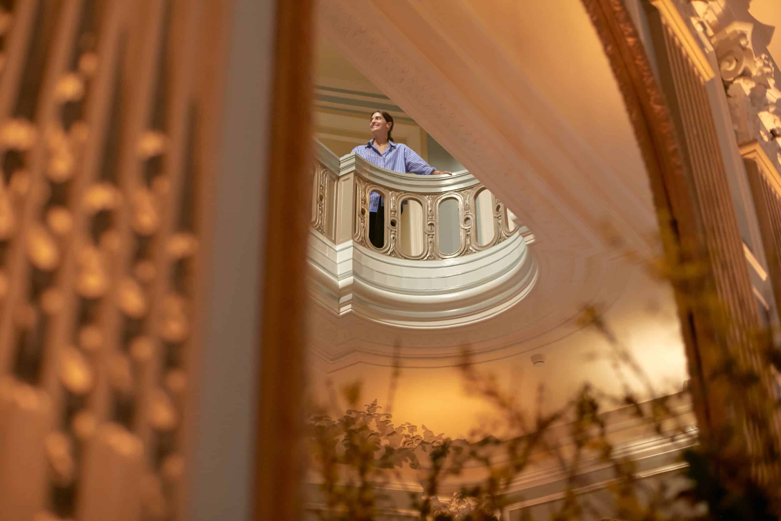 Artistic view of woman standing on above balcony