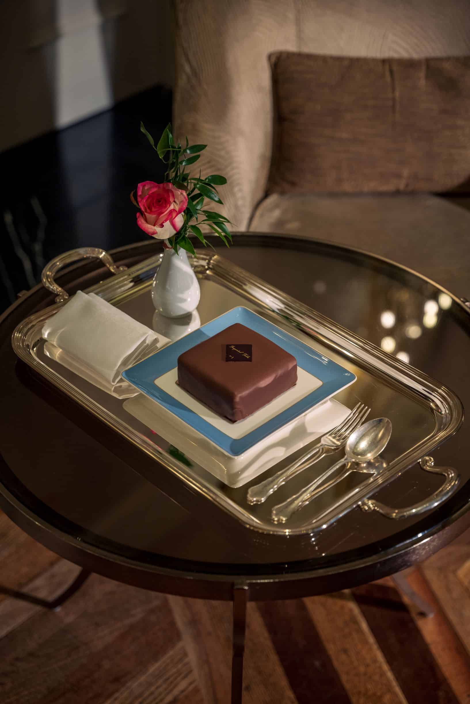torte displayed on gold serving tray
