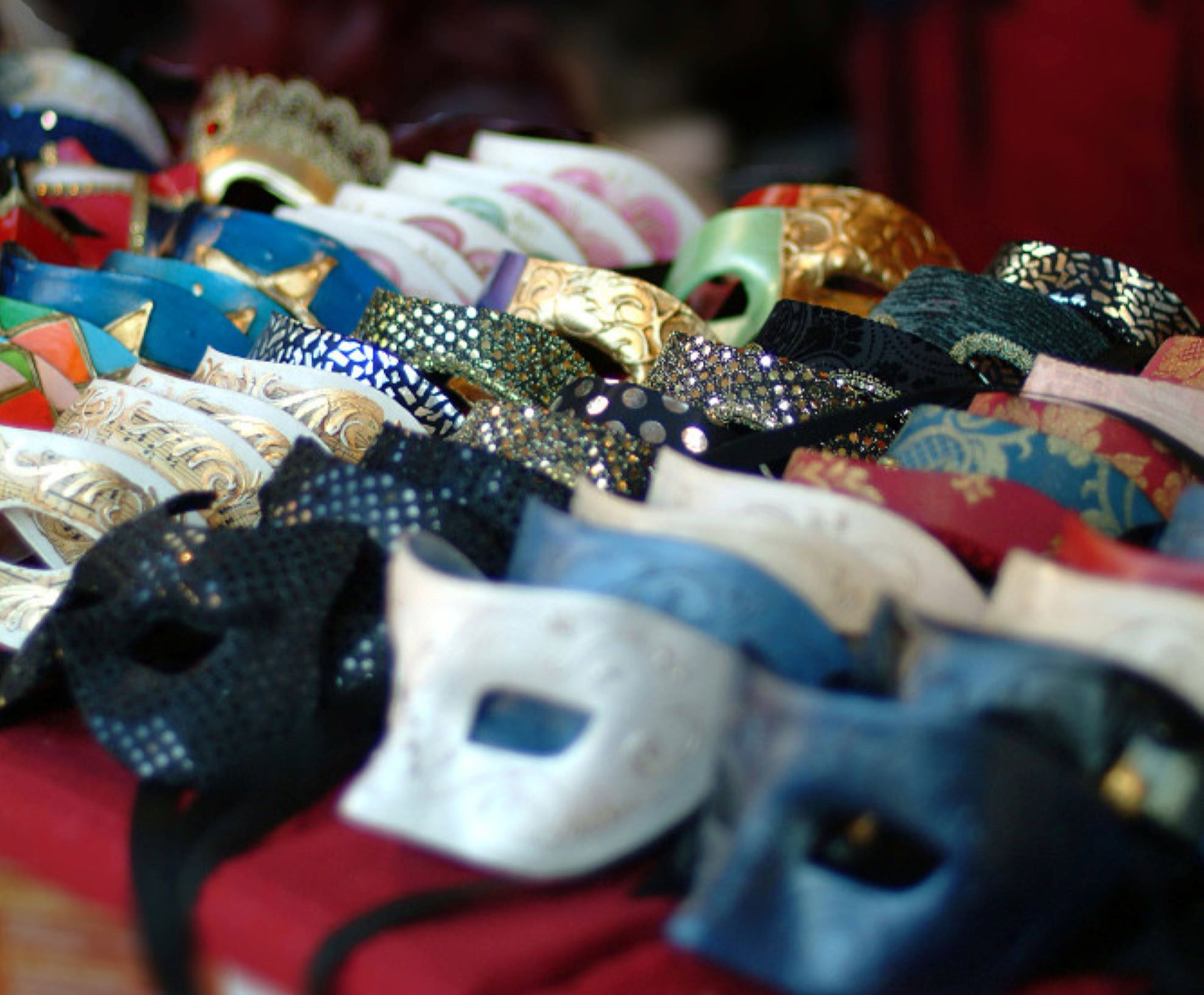 A table displaying a variety of masks, showcasing different types and designs.